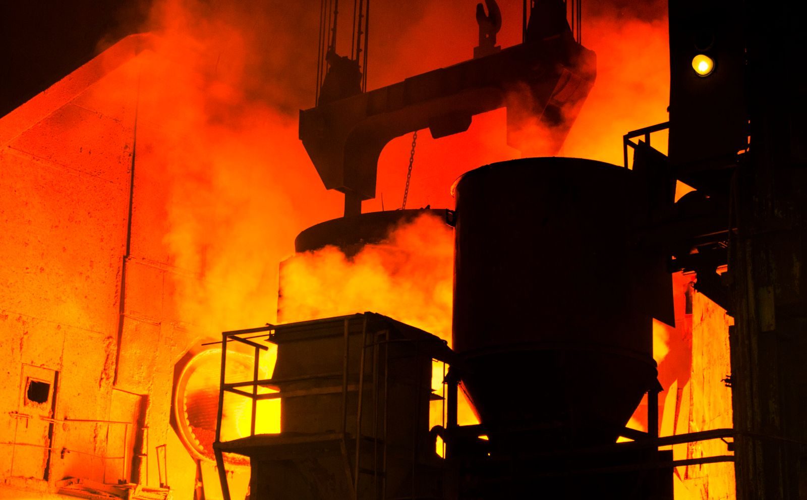 Industrial burner flame inside a boiler